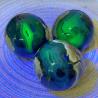 Vulkanachatkugel: Heilkristall mit UV-Fluoreszenz