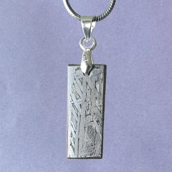 Pendentif météorite Muonionalusta : pierre précieuse de fer naturel
