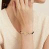 Hexenknoten-Armband | Anhänger aus Edelstahl und roter Schnur