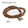 Bracciale Mala buddista tibetano - Perline di legno e ciondolo di loto