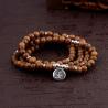 Bracciale Mala buddista tibetano - Perline di legno e ciondolo di loto