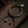 Bracciale tibetano con nodo portafortuna | Fatto a mano con ciondolo in argento