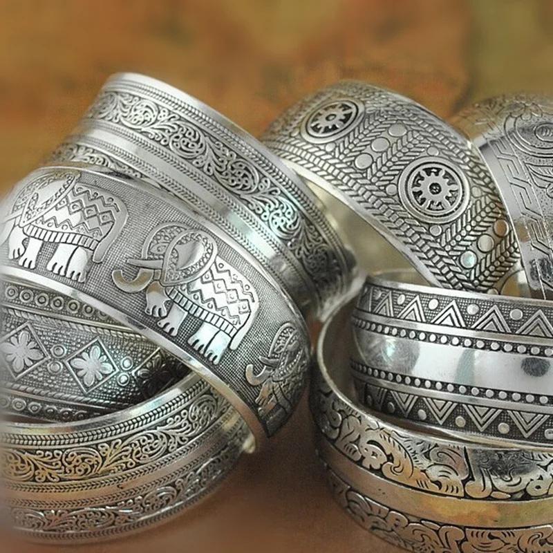 Bracelet manchette vintage en argent tibétain | Motifs floraux et animaliers