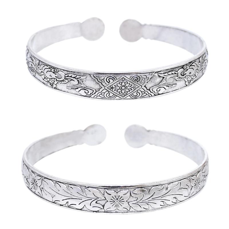Bracciale rigido vintage in argento con intaglio a forma di fiore per donna