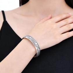Bracciale rigido vintage in argento con intaglio a forma di fiore per donna