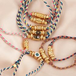 Armband mit Baumwollknoten und Nazar-Motiv – Schutz- und Modeschmuck