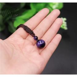 Collier pendentif œil de tigre en obsidienne : Chance et style