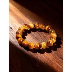 Bracciale in occhio di tigre arancione: pietra naturale ed energia curativa