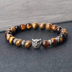 Armbänder aus Natursteinperlen: Armreif mit Eulen-, Malachit- und Lava-Anhänger