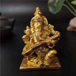 Müzikli Altın Ganesha Heykeli: Fil Tanrısı Dekorasyonu