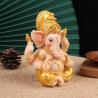 Goldene Ganesha- und Buddha-Statuen: Elefanten für die Heimdekoration