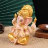 Goldene Ganesha- und Buddha-Statuen: Elefanten für die Heimdekoration